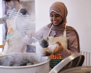 volunteer serving food