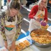 Packing food at London Feeding Programme